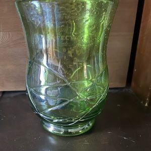 Vintage vase green in color and squiggly lines and bubbles